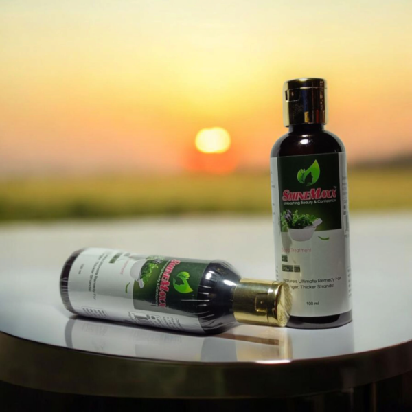 Close-Up of Hair Growth Oil Bottle with Herbal Extracts